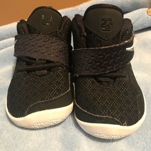 LeBron James baby boy sneakers in black .